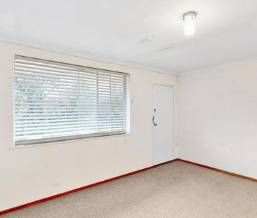 Affordable Comfort in a Prime Location - Photo 1