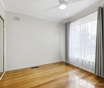 Stylish Renovated Home Offering Comfort and Space - Photo 6