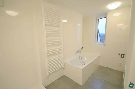 Moderne 4-Zimmer-DG-Wohnung mit großer Dachterrasse - Photo 4