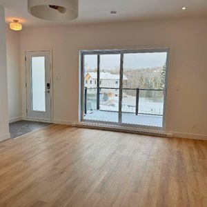 3 1/2 condo locatif neuf - Photo 2