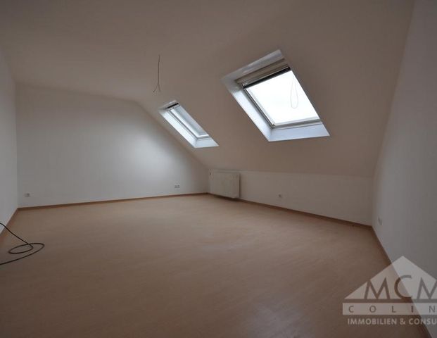 Gepflegte Dachgeschosswohnung in ruhiger Lage Neu-Isenburgs - Foto 1