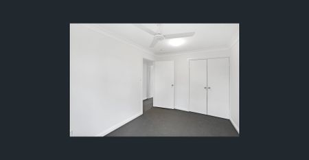 Spacious Two-Bedroom Townhouse in Convenient Location - Photo 5