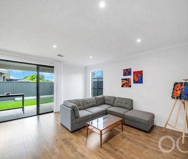 Open the Door to Sun-Soaked Living in a Premium Woodville West Pocket - Photo 3