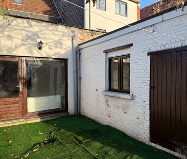 Verzorgd gelijkvloers 1-slpk appartement met tuin - Photo 3