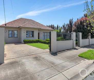 Open the Door to Style, Security, and Location in Woodville South - Photo 2