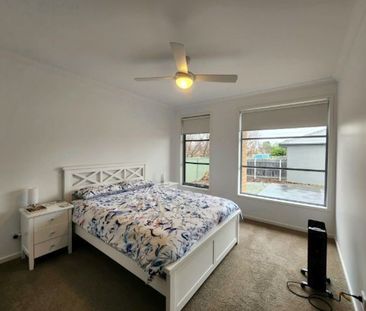 CHARMING FAMILY HOME WITH MODERN FEATURES AND SPACIOUS YARD - Photo 4