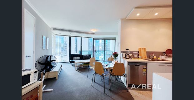 Elegant Furnished Apartment with Secure Parking & Premium Amenities - Photo 1