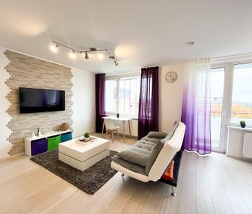 Modernes City-Apartment mit atemberaubender Skyline & Parkblick - Foto 1