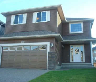 NEW EXECUTIVE HOUSE IN SW - 04BD RMs/Bonus RM Available Immediately! | 129 Everhollow Rise Southwest, Calgary - Photo 1