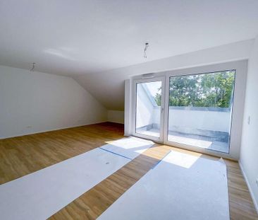Charmante 1,5 Zimmer-Dachgeschosswohnung mit Balkon - Foto 1