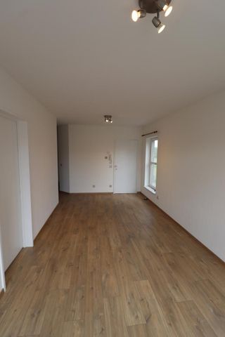 Een gerenoveerd appartement op de eerste verdieping achteraan met autostaanplaats - Foto 3