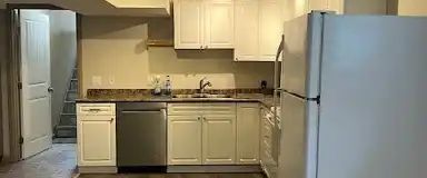 Large open basement suit | 7415 25 St SE, Calgary - Photo 1