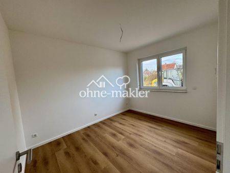 Erstbezug: Helle 3-Zimmer Wohnung mit Einbauküche, Terrasse, Garten und Stellplatz - Photo 5