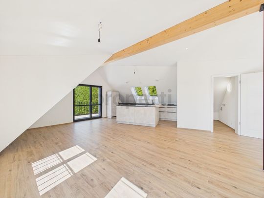 Attikawohnung direkt am Waldrand mit Zürichseeblick, Minergie-Standard und Free-Cooling - Foto 1