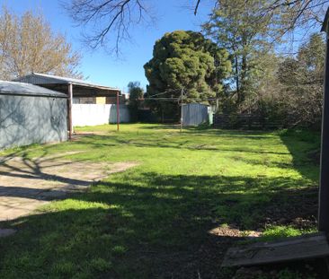 Convenient Three Bedroom Home - Photo 1