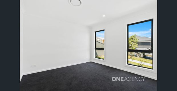 STYLISH AND SPACIOUS FAMILY HOME IN TULLIMBAR - Photo 1