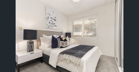 Spacious Three-Bedroom Apartment with District Views & Lock-Up Garage - Photo 4