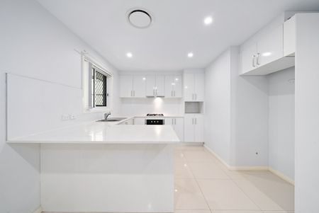 Rare Three Bedroom Family Opportunity Close to All Amenities! - Photo 2