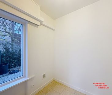 Gelijkvloers appartement met 2 slaapkamers, ruime garage en tuin - Photo 4
