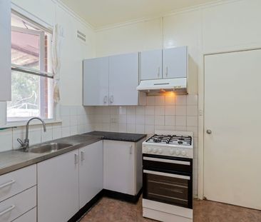 Freshly Painted 3-Bedroom Home on a Large Block - Photo 2