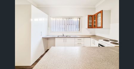 Spacious Brick Family Home with Renovated Kitchen & Entertainer's Rumpus Room - Photo 5