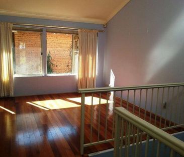 Town House with a Difference - Spacious Tri-Level + uninterrupted v... - Photo 1