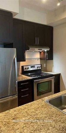 Confederation/Burnhamthrope Stunning 1Bdrm +Den Open Concept Kitchen - Photo 1