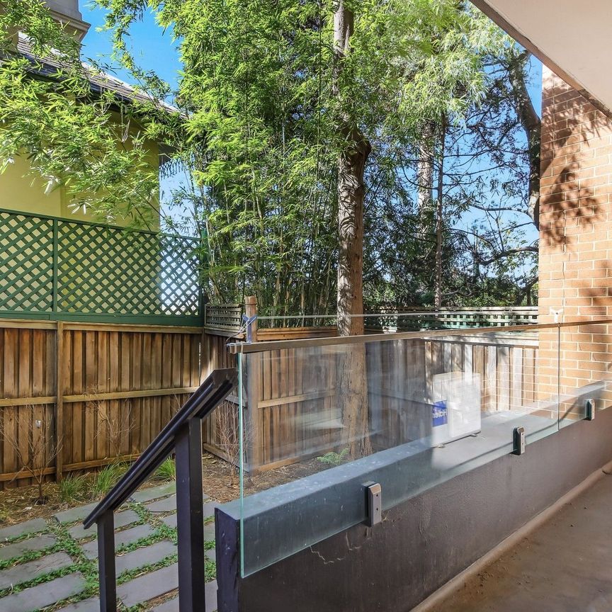 Pet Friendly 2 Bedroom Unit with Private Courtyard and Secure Car Spot - Photo 1