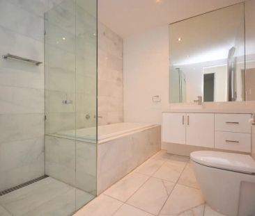 “EXTRAORDINARY TOWNHOUSE LIVING NEARBY THE BEACH” - Photo 6