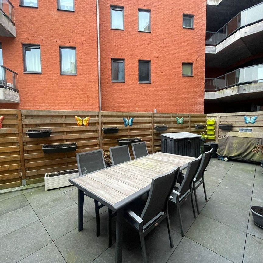 Modern gelijkvloers appartement met terras in hartje stad - Foto 1