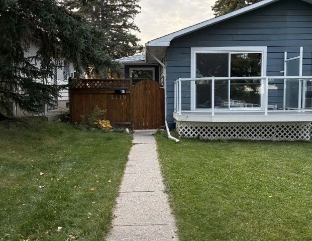 Bright & Charming 2-Bedroom Home | Steps to Confederation Park — 2 Bedrooms Duplex - Photo 1