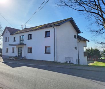 Dachgeschosswohnung mit Balkon und traumhaften Ausblick ins Grüne! - Photo 6