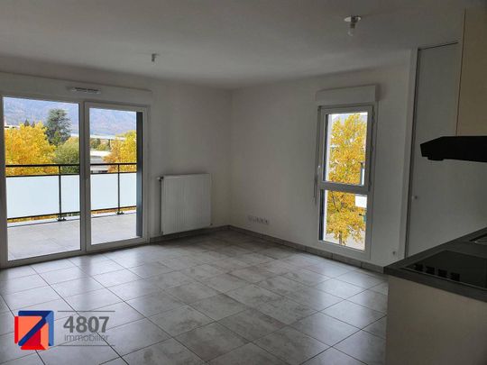 Location appartement récent 3 pièces 55.08 m² à Cluses (74300) 5 - Photo 1