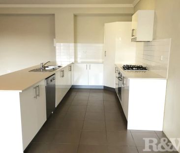 “Well presented 2 bedroom unit located in a secure building” - Photo 3