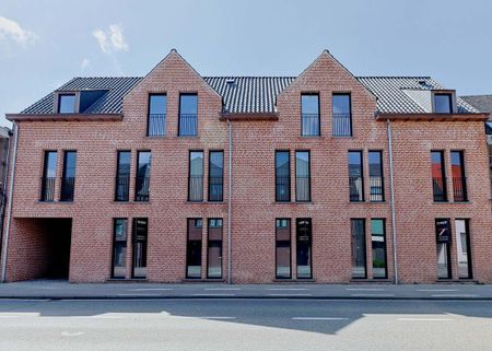 Super interessant gelegen gelijkvloersappartement met 1 slaapkamer, kelderberging en staanplaats met zicht op woonerf. - Photo 2