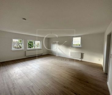 Erstbezug nach Modernisierung von geräumiger Souterrain-Wohnung (2 ... - Foto 1