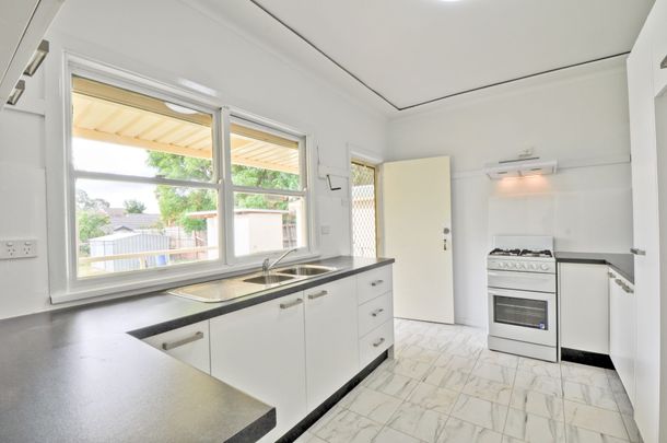 Four bedroom home with spilt system airconditioning - Photo 1