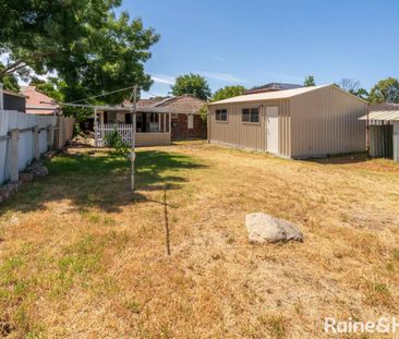 VERSATILE LAKE ALBERT HOME WITH SHEDS AND STUDY - Photo 4