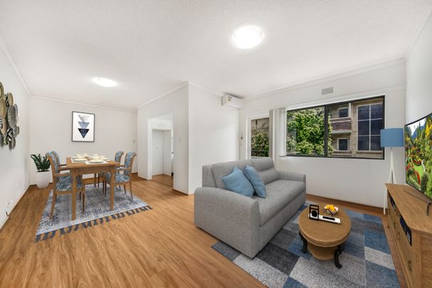 Centrally Located Two Bedroom Unit with Air Conditioning in a Parkside Location! - Photo 1