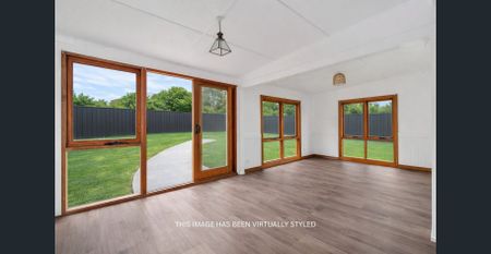 Charming Cottage in Prime Location - Photo 2