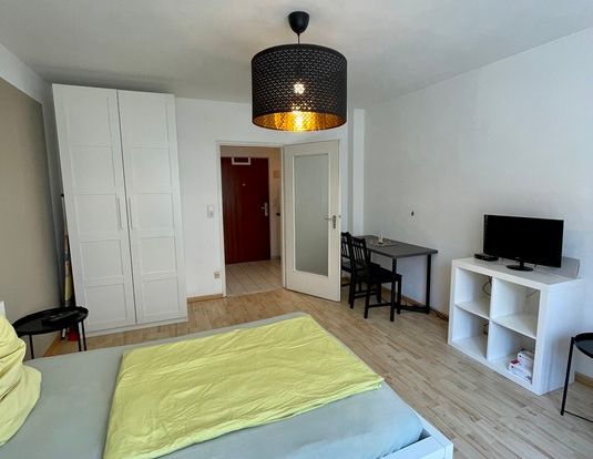 Modern möblierte 1-Zimmer-Wohnung im Zentrum - Foto 1