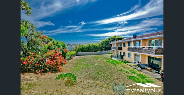 One-Bedroom Unit with Stunning Coastal Charm - Photo 1