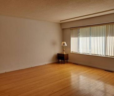 3 Bedroom suite for rent close to Joyce skytrain & transit - Photo 1