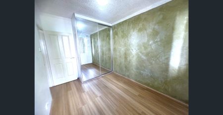 Neat and tidy 2-bedroom unit with air-conditioning - Photo 4