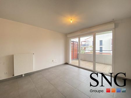 T2 AVEC BALCON ET PLACE DE PARKING - Photo 4