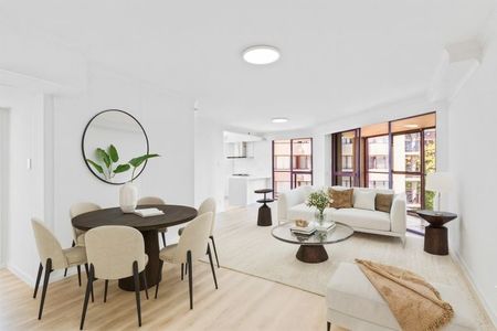 Stylish Renovated Apartment with Wrap-Around Balcony - Photo 4