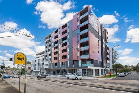 Entry via Block C, As new 1-bedroom modern apartment now for lease! - Photo 3