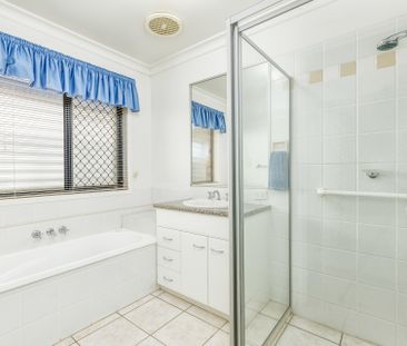 Lovely 4 Bedroom home with Side Access - Photo 1