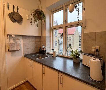 Hyggelig 2-værelses lejlighed med New Yorker-væg - Photo 6