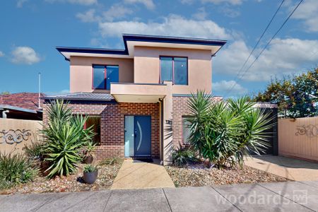 Freshly Painted and Renovated Home with Modern Features - Photo 5